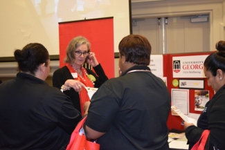 staff members interacting at a booth