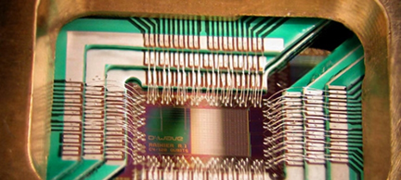 photo of computer chip and holder