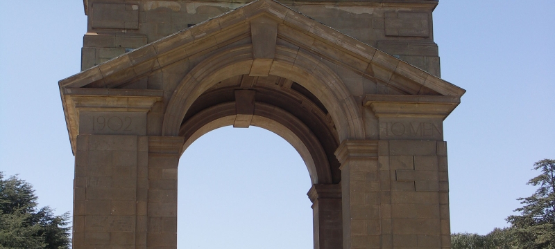 photo of arched monument with four pillars 