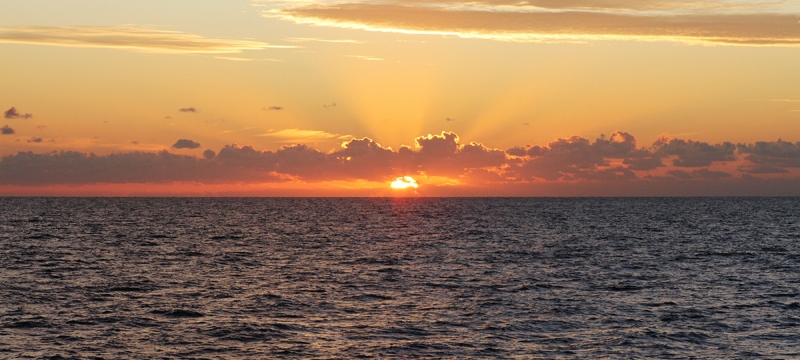 photo of sunrise over ocean