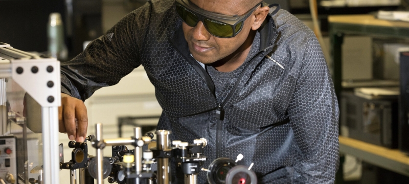 photo of man in lab with protective eyewear