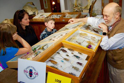 man with bugs under glass, kids