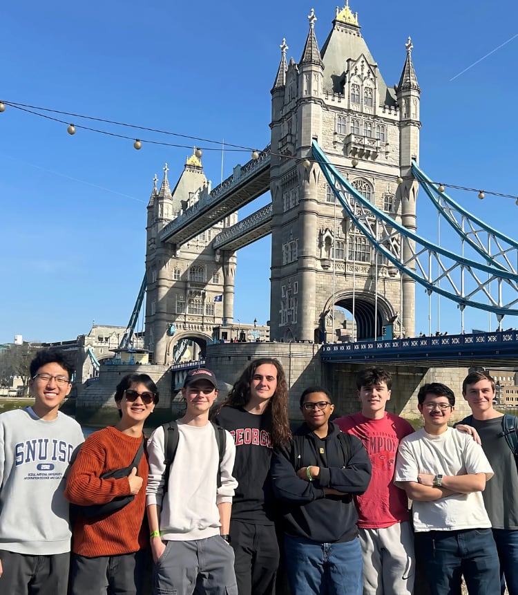 Students in front of bridge in London