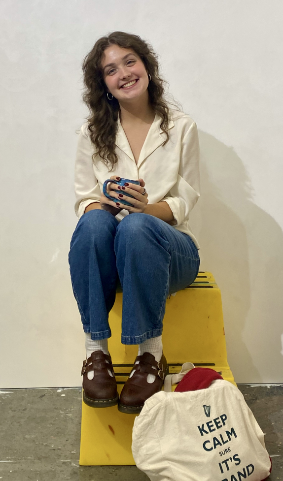 Caroline Moore in front of wall