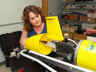 photo of woman with underwater robotic glider