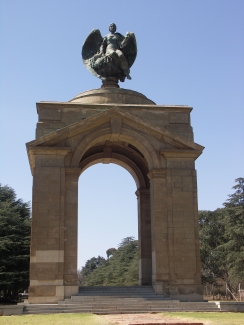 photo of arched monument with four pillars 