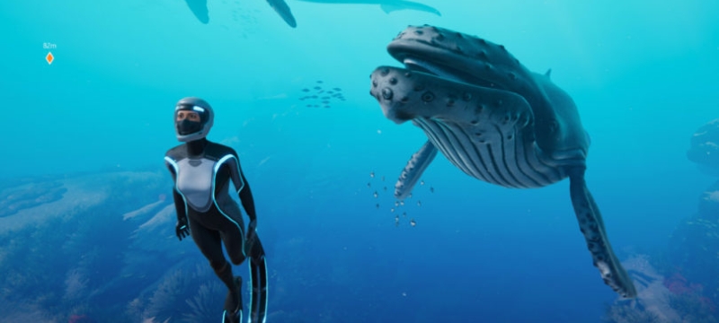 still image from undersea video game, with diver and whale
