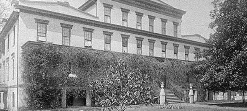 historical black and white photo of a large building