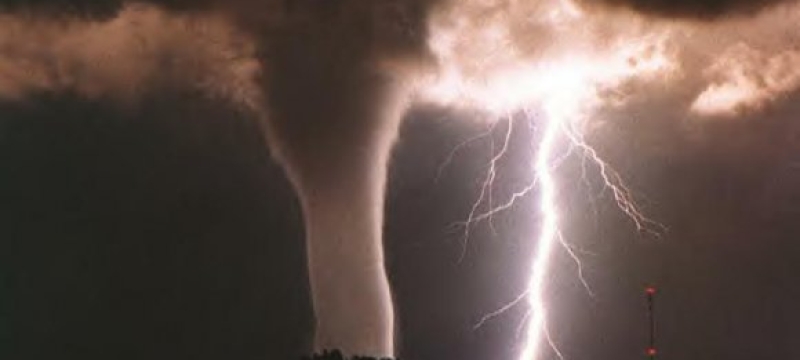 photo of lightning and a tornado funnel
