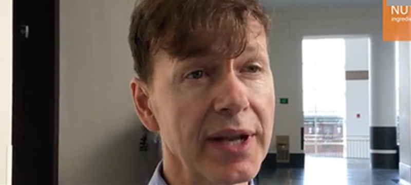 screenshot of man interview in video