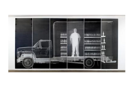 x-ray of man inside truck