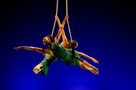 photo of two aerial dancers in performance