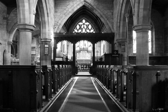 black and white photo of empty church sanctuary
