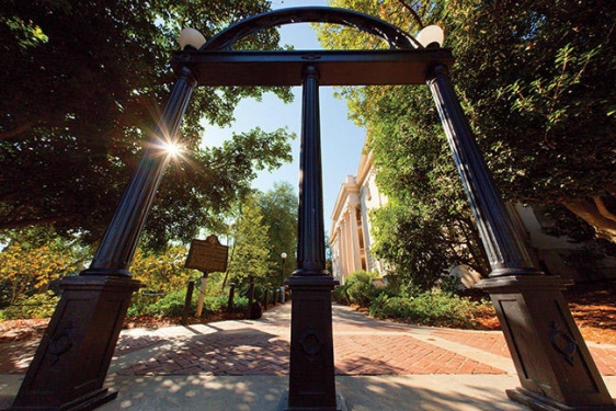 stretched photo of UGA arch day