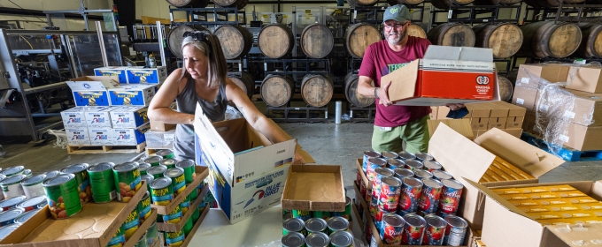 photo of two people at food pantry warehouse