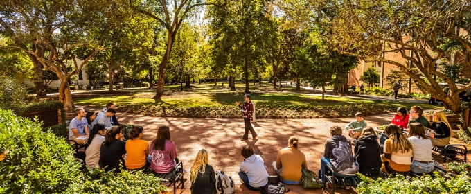 photo of people on north campus quad, day, with trees, shadows